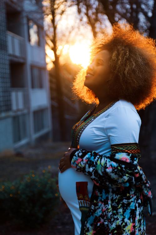 A Woman With Natural Hair With Her Hair Dyed When Pregnant