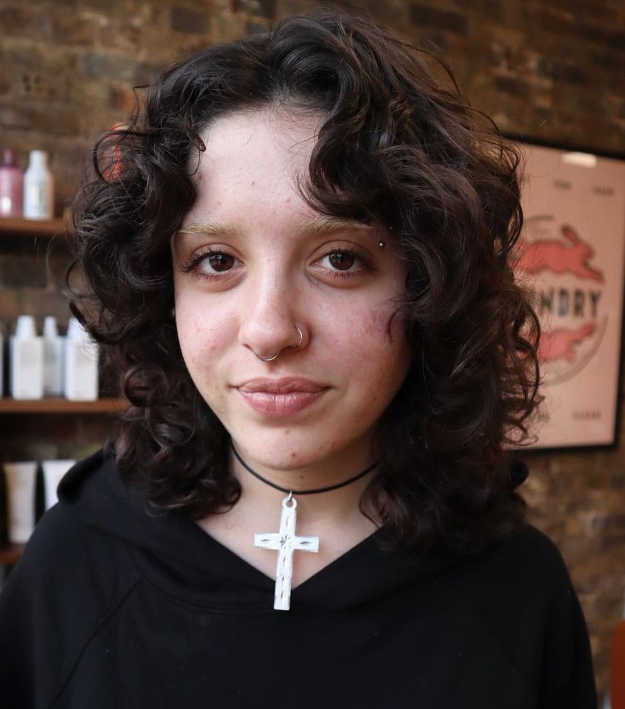 Wolf Cut with Curtain Bangs for Wavy to Curly Hair