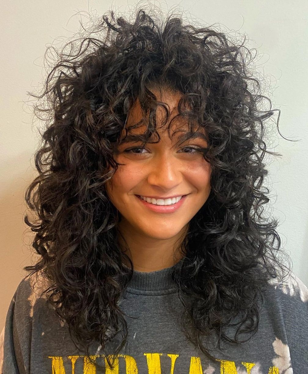 Curly Wolf Cut with Wispy Bangs