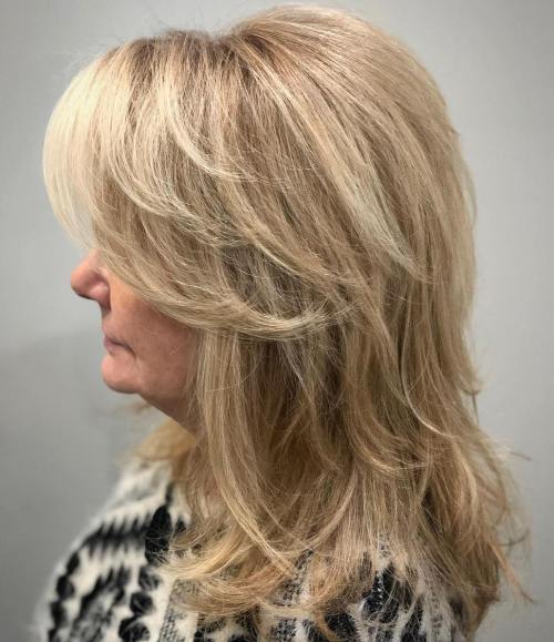 Medium Feathered Haircut For Women Over 50