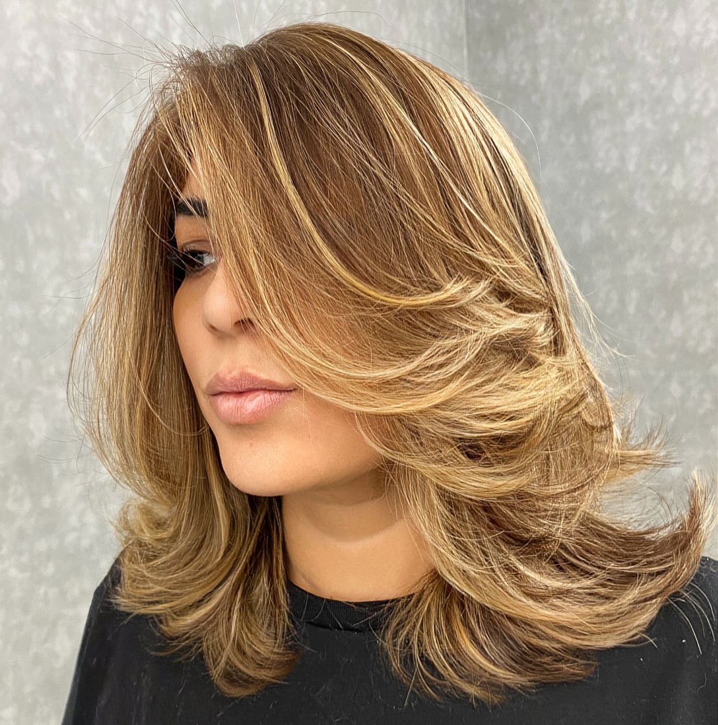 Thick Hair Medium Length Feathered Hairstyle for Thick Hair