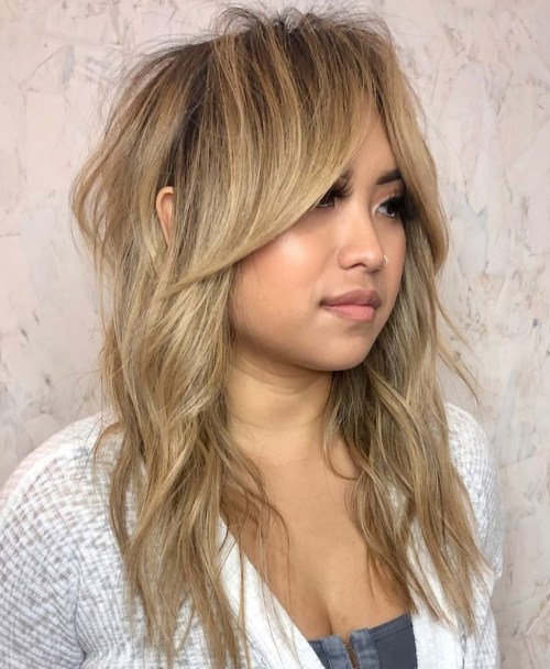 Messy Blonde Shag with Long Curtain Bangs