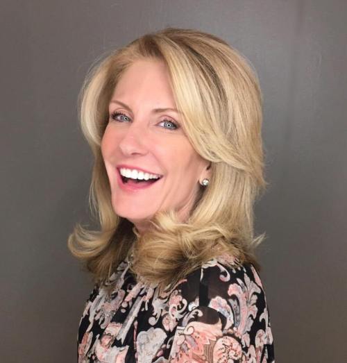 Medium Blonde Hair with Parted Bangs