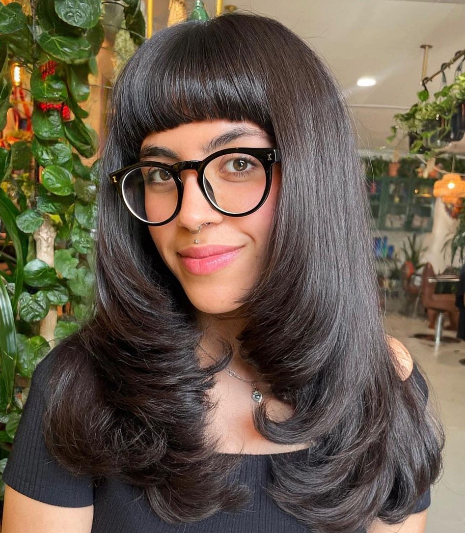 Thick Layered Locks with Blunt Bangs