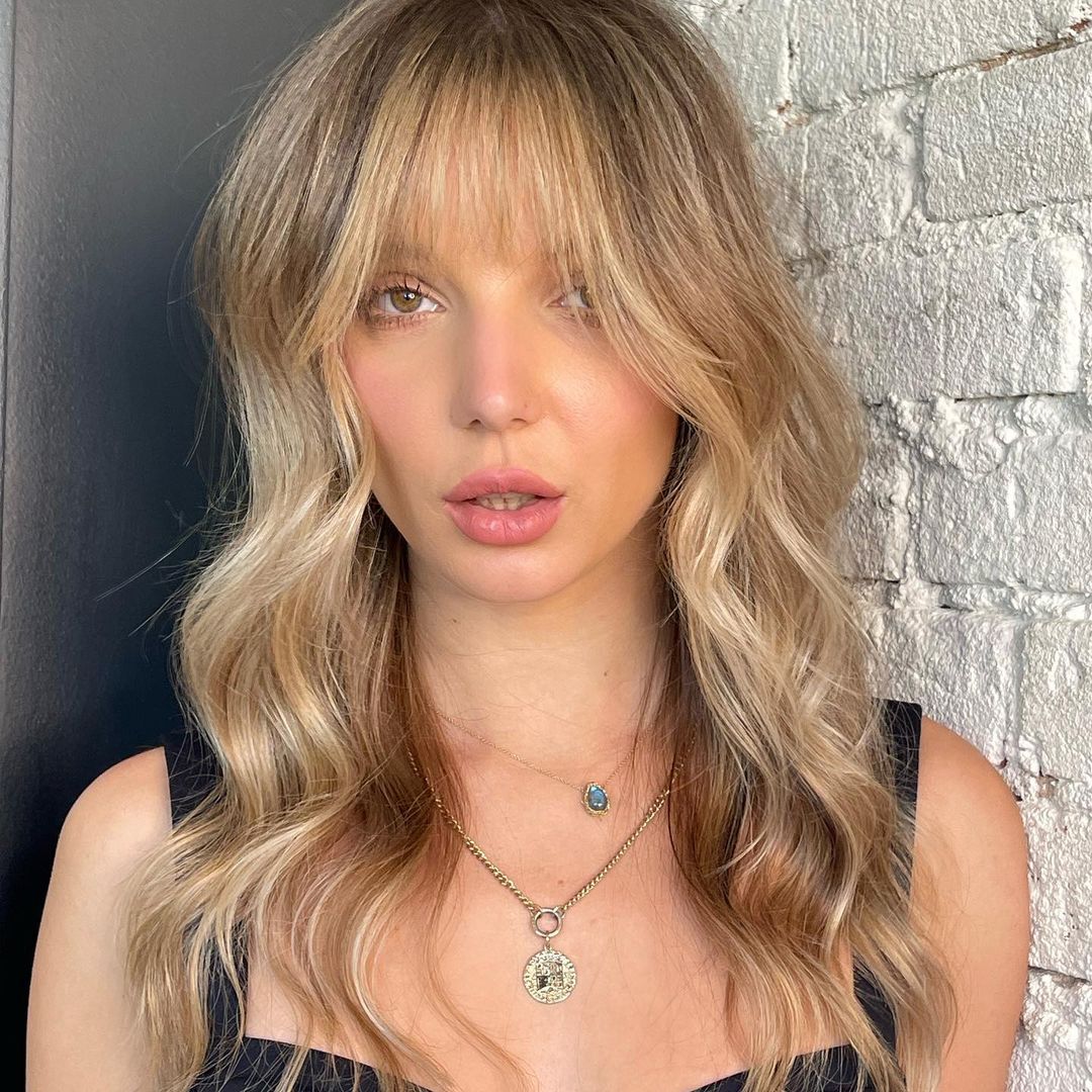 Tousled Blonde Waves with French Bangs