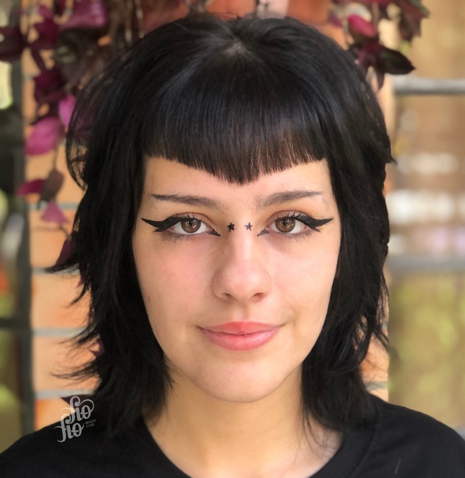Short Black Shag with Pointed Bangs