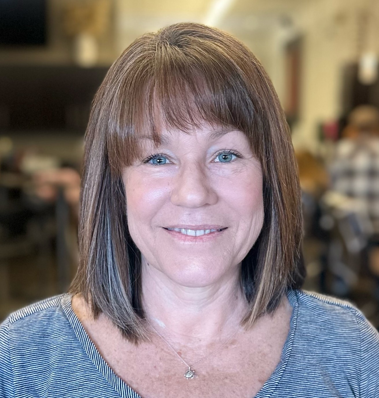 Midi Cut with Wispy Arched Bangs Over 50