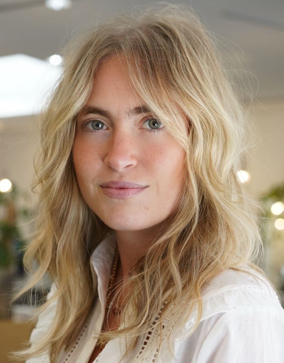 Mid Length Layered Wavy Hairstyle