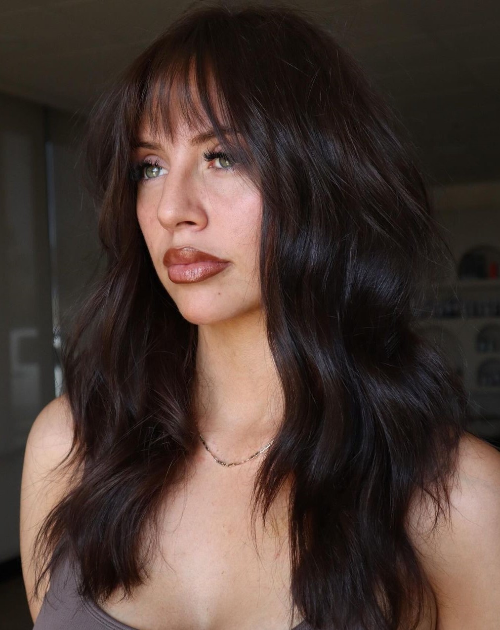 Layered Hair with Wispy Bangs